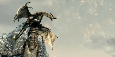 A dragon perched on a large stone pillar