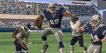 A player in blue, jumping through his opposition