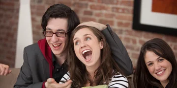 A couple of people, enjoying playing the game