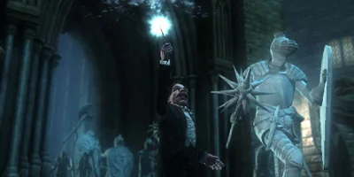 A wizard holds his wand high above his head