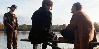 Enoch and Annabel Sitting on a Bench