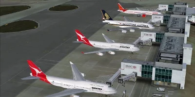 Two large 747s along side the massive Airbus A380 of Singapore Airlines