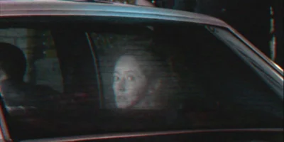 Ghost in Back of Car