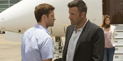 Ivan and Richie Talking by a Plane, Rebecca in Background