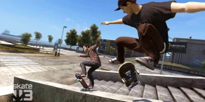 two men skating down a set of steps