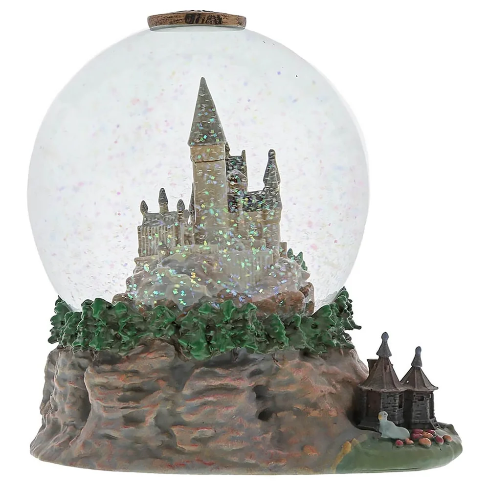 Boule à paillettes Château de Poudlard et hutte d’Hagrid (12 cm) – Le Monde magique d’Harry Potter Image 1